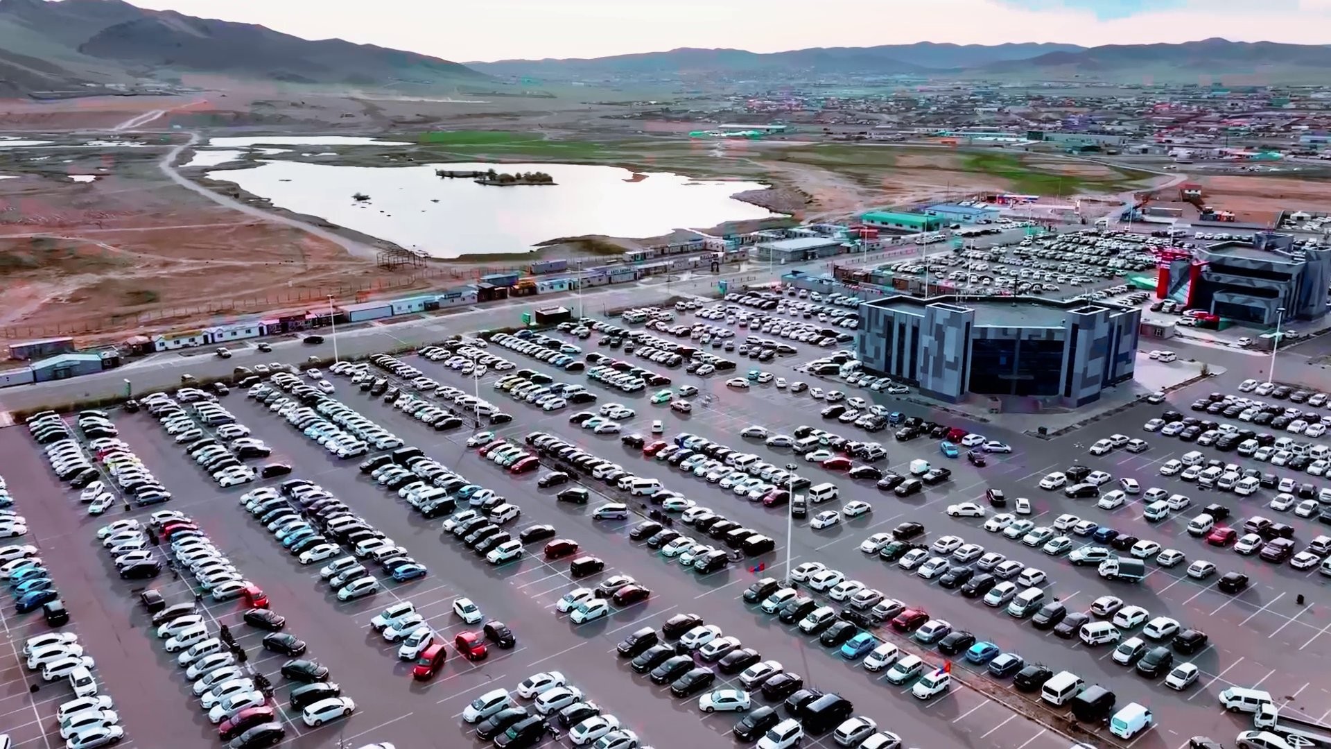 Straight metallic shapes with a blue gradient